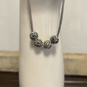 A set of 4 Brighton Silver Designer Motif Mini Beads - Bracelet is Not Included